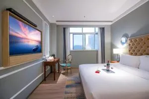 贵宾舍兴城酒店 梅州兴宁火车站兴一广场店 - Zijin