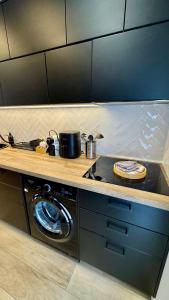 Appartements Le Domaine Des Yebles - Appartement Calme et elegant : photos des chambres