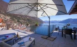 Attico Con Grande Terrazza vista Lago - سْكينيانو