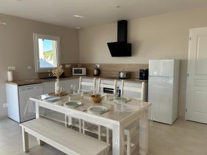 Maisons de vacances Les Dunes - Omaha Beach : photos des chambres