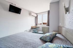 Hotels Hotel Triton : photos des chambres