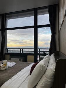 Premium Suite with Balcony at The Gramercy Makati Manila
