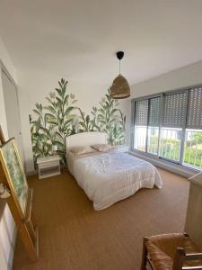 Maisons de vacances Maison bord de mer 50 M : photos des chambres