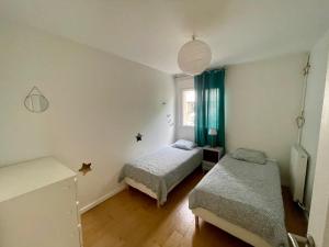 Appartements Loft 3 pieces sur jardin - 15 minutes de Paris avec parking : photos des chambres