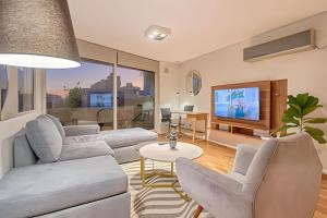 Moderno Penthouse con Terraza y Parrilla Privada