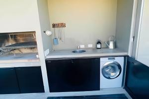 Moderno Penthouse con Terraza y Parrilla Privada