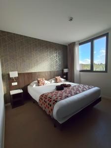 Hotels Brit Hotel Ploermel - Hotel de l'Hippodrome : photos des chambres