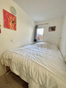 Appartements Studio 4 places avec jardin : photos des chambres