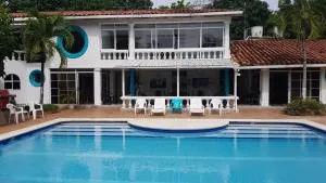 Coral House SAI - El Cove