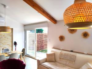 Appartements Saint Martial - Stationnement - Clim : photos des chambres