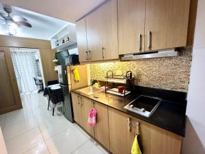 Kathys Crib with balcony Pool view at Shell Residence