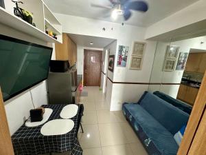 Kathys Crib with balcony Pool view at Shell Residence