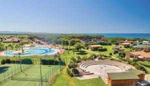 Village with swimming-pool and private equipped beach in Montalto Marina