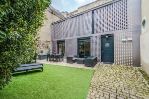 Maison d'architecte centre Tours jardin, climatisation, parking 5 p