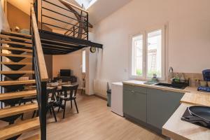 Appartements Loft type industriel : photos des chambres