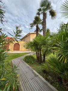 Villas La Villa des Moments Chaleureux : photos des chambres