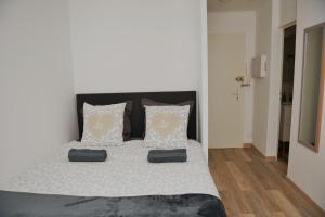 Appartements Centre-ville a vos pieds : photos des chambres