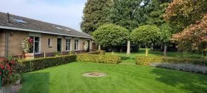 Wellness bungalow met privésauna en hot tub - Glamping aan de Maas - 凯瑟尔