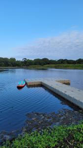 Guarajuba feitoparavoce - conforto e charme à beira do lago, lazer completo, próximo a praia, na melhor localização de Guarajuba