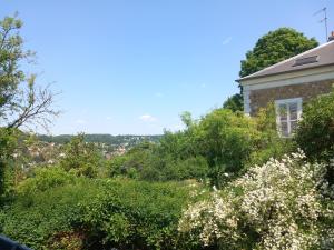 Appartements maison avec jardin et terrasse : photos des chambres