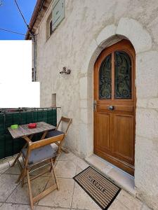 Appartements Maison de village climatisee : photos des chambres