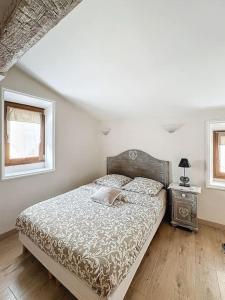 Appartements Maison de village climatisee : photos des chambres