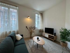 Appartements Au Galop - Proche stade equestre : photos des chambres
