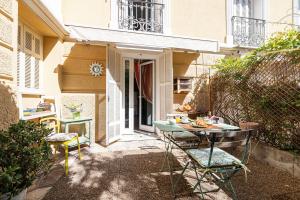 Appartements Les Orangers - Happy Rentals : photos des chambres