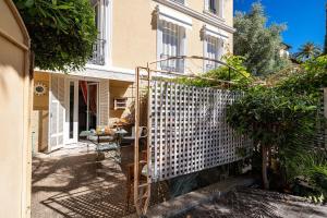 Appartements Les Orangers - Happy Rentals : photos des chambres