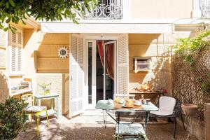 Appartements Les Orangers - Happy Rentals : photos des chambres