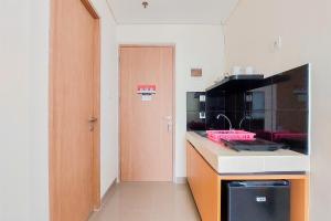 Homey and Comfort Studio Apartment at B Residence By Travelio