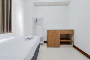 Homey and Cozy Stay 1BR Loftvilles City Apartment By Travelio