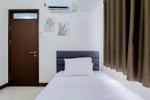 Homey and Cozy Stay 1BR Loftvilles City Apartment By Travelio