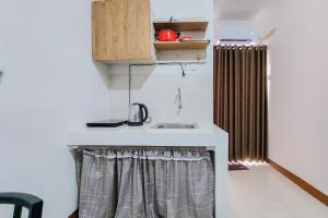 Homey and Cozy Stay 1BR Loftvilles City Apartment By Travelio