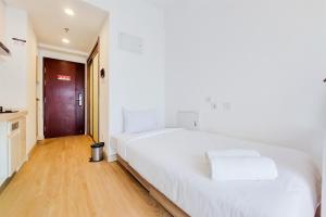 Good Choice Studio at Sky House BSD Apartment By Travelio