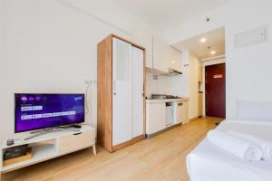 Good Choice Studio at Sky House BSD Apartment By Travelio
