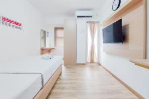 Homey Studio (No Kitchen) Urbantown Serpong Apartment By Travelio