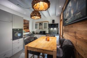 Chalets Chalet Mokki, bain nordique, balneo et sauna : photos des chambres