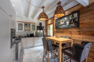 Chalets Chalet Mokki, bain nordique, balneo et sauna : photos des chambres