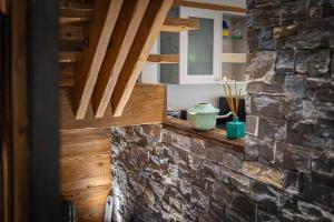 Chalets Chalet Mokki, bain nordique, balneo et sauna : photos des chambres