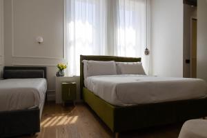 Chambre Triple avec Salle de Bains Privative