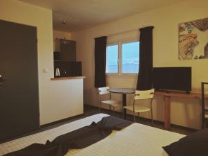 Appart'hotels Appart'hotel Residella House Room & Kitchen Avignon Le Pontet : photos des chambres