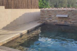 Maisons de vacances Tiny house avec piscine a Figari : photos des chambres