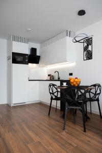 City Center Grzybowska, next to Warsaws Business District, Metro ONZ & Westin Hotel by WarsawSkyLine Apartments