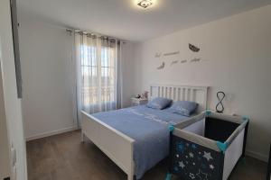 Appartements COSY F2 Proche Disneyland Paris : photos des chambres