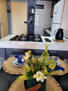 Flat com dois quartos na praia do Cabo Branco - climatizado e completo