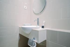 Best Choice and Restful 1BR CitraLake Suites Apartment By Travelio