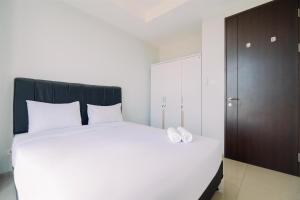 Best Choice and Restful 1BR CitraLake Suites Apartment By Travelio