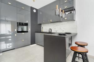 Lux Traugutta Apartment with Air Conditioning and Parking by Noclegi Renters