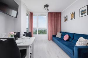 Przestronny Apartament z Balkonem by Noclegi Renters